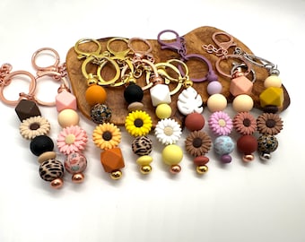 Llavero con cuentas de flores / Dije de silicona para bolso