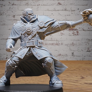 May include: A light gray figurine of a male character in a dynamic pose, holding a spherical object. The figure is dressed in a detailed military-style uniform with a belt, shoulder pads, and boots. The background is a light brick wall.