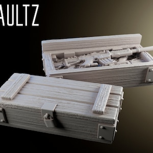 May include: Two wooden crates, one open and one closed. The open crate contains a rifle and other military equipment. The closed crate has a metal latch and hinges.