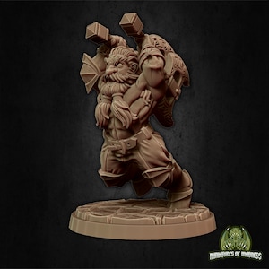 May include: A brown painted miniature figurine of a dwarf warrior holding two hammers. The dwarf is wearing armor and a belt. The miniature is standing on a round base.