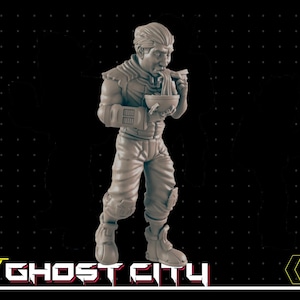 May include: A gray 3D printed miniature figure of a person wearing a futuristic outfit and eating noodles from a bowl. The figure is standing on a black background. The text "Ghost City" is visible at the bottom of the image.