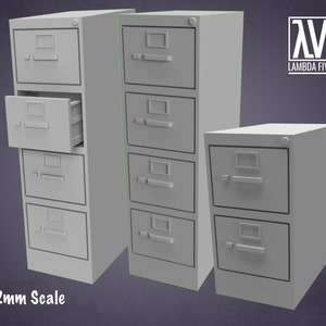 May include: Three grey metal filing cabinets with drawers. The cabinets are different sizes. The largest cabinet has five drawers, the middle cabinet has four drawers, and the smallest cabinet has two drawers. The cabinets are labelled "32mm Scale".