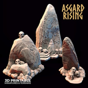 May include: Three 3D printed stone structures with intricate carvings and skulls. The tallest structure features a carving of a horse and rider with the text "Asgard Rising" above it. These structures are designed for tabletop gaming and role-playing.