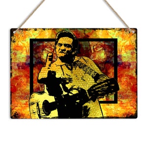 May include: A black and white silhouette of a musician playing a guitar. The image is set against a colorful, abstract background with shades of yellow, orange, and red.