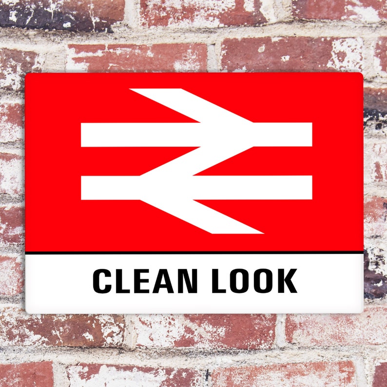 May include: A red and white sign with the British Rail logo and the text "CLEAN LOOK" in black letters.