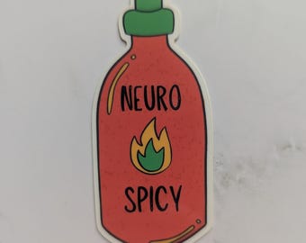 May include: A die-cut sticker shaped like a hot sauce bottle with a red body and a green cap. The text NEURO SPICY is printed in black letters above and below a central yellow and green flame graphic. The design features a subtle speckled texture.