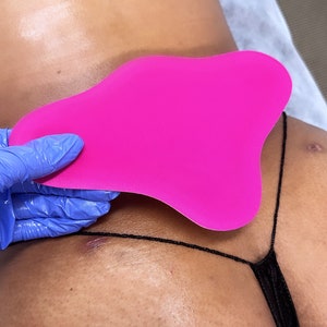 Compression board for lower back