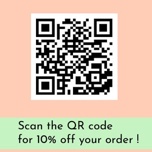 May include: A black and white QR code with the text "Scan the QR code for 10% off your order!" on a light green background.