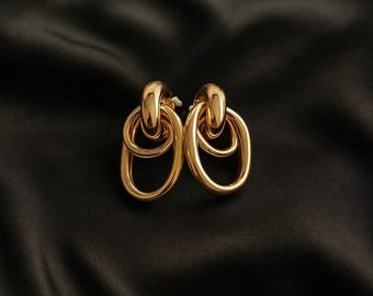Pendientes de estilo minimalista moderno y elegante para mujer