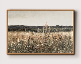May include: A framed painting of a field of wildflowers in shades of green, brown, and white. The field is in the foreground, with a line of trees in the background. The sky is a light gray.