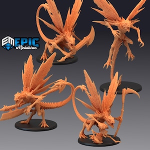 May include: Four detailed, orange-colored, 3D printed miniature figures of skeletal creatures with wings. Each figure has a different pose and is holding a weapon. The figures are on a white background.
