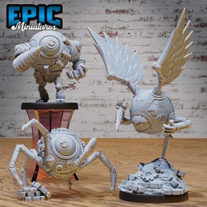 May include: Three 3D printed, grey, steampunk-style robot miniatures. One robot is a sphere with wings, another is a sphere with legs, and the third is a sphere with a drill arm.