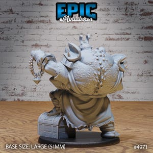 May include: A gray, detailed miniature figurine of a goblin-like creature wearing armor and holding a chain with a gem at the end. The figurine is standing on a treasure chest and has a base size of large (51mm). #4971