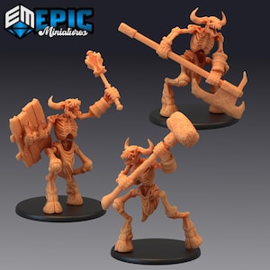 May include: Three miniature skeletal figures of minotaurs, each with a different weapon. One holds a large axe, another a hammer, and the third a shield and a mace.