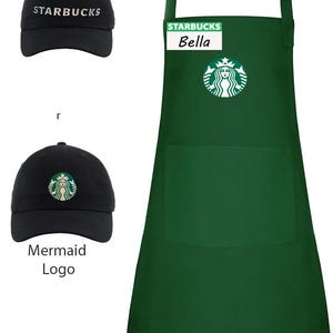 May include: A dark green apron featuring a white Starbucks logo and a name tag reading Bella, alongside two black baseball caps. One cap displays the white text Starbucks, while the other features the circular green and white Starbucks mermaid logo.