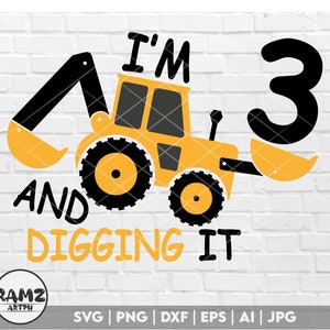 May include: A yellow toy construction vehicle with a black number 3 and the text "I'm 3 and digging it".