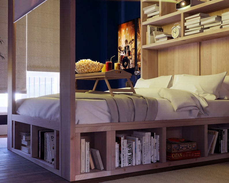 May include: A wooden bed frame with built-in shelves for storage. The bed has a white comforter and two pillows. There is a tray on the bed with popcorn and drinks.