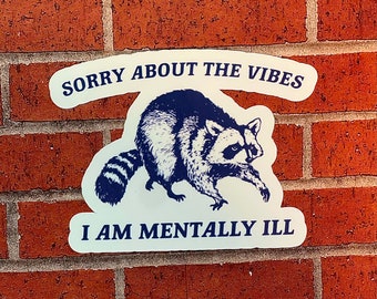 Sorry about the vibes I’m mentally Ill raccoon waterproof vinyl sticker decal