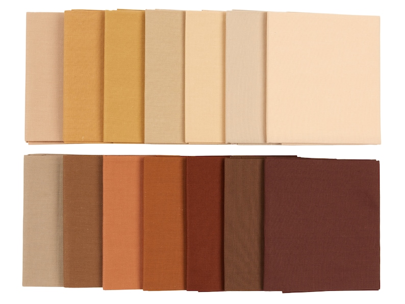 May include: A set of 18 fabric swatches in shades of brown and beige. The swatches are arranged in two rows, with the lighter shades on top and the darker shades on the bottom.