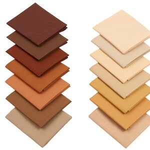 May include: A stack of eight fabric squares in shades of brown and beige. The squares are arranged in a gradient from dark brown to light beige.