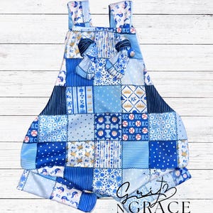 May include: A white ceramic mug with a black handle and the text "But First, Coffee" in a handwritten style. The mug is on a white surface. The mug is 4 inches tall.