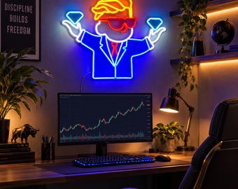 May include: A neon sign featuring a stylized figure in a suit and sunglasses, holding a diamond in each hand. The figure has yellow hair, red glasses, and a blue suit outline. The sign emits a bright glow against the wall above a computer monitor.