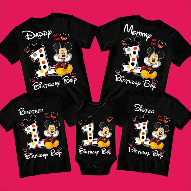 May include: Black family birthday shirts and a onesie featuring Mickey Mouse. Each shirt has a large number 1 with polka dots, Mickey Mouse, and the words "Daddy", "Mommy", "Brother", and "Sister". The onesie says "Birthday Boy".