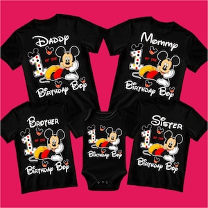 May include: Black family birthday shirts and a onesie featuring Mickey Mouse. The shirts read "Daddy," "Mommy," "Brother," and "Sister," with "1 of the Birthday Boy" and Mickey Mouse graphics. The onesie also has a Mickey Mouse graphic.
