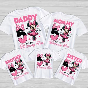May include: A set of four white t-shirts with pink and black Mickey Mouse designs. The shirts say "Daddy", "Mommy", "Brother", and "Sister" with the number "5" and the text "of the birthday girl".