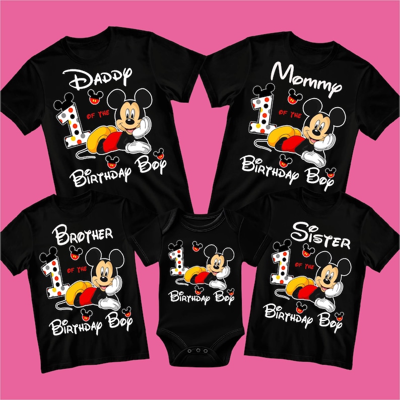 May include: Black family matching shirts and a onesie featuring Mickey Mouse. The shirts say "Daddy", "Mommy", "Brother", and "Sister" with "1 of the Birthday Boy" and Mickey Mouse graphics. The onesie says "Birthday Boy".