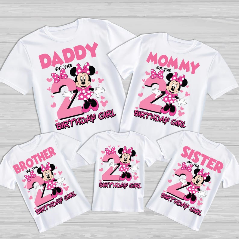 May include: White t-shirts with pink Minnie Mouse graphics and the number 2. The shirts are labelled "Daddy", "Mommy", "Brother", "Sister", and "Birthday Girl". The design includes hearts and bows.