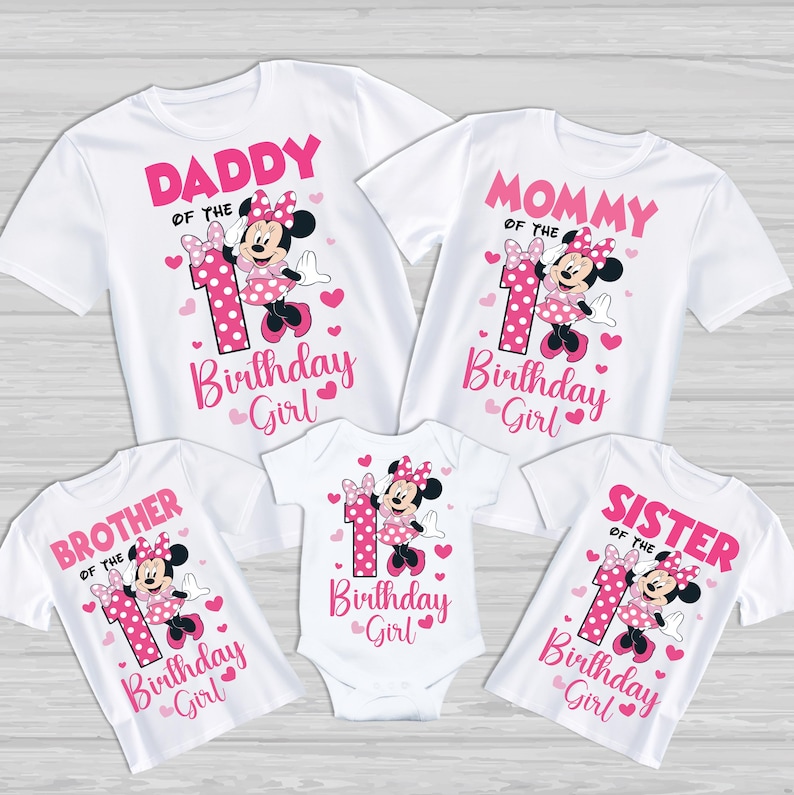 May include: White t-shirts with pink text and Minnie Mouse graphics. The shirts read "Daddy," "Mommy," "Brother," and "Sister" with "of the Birthday Girl." A onesie also reads "Birthday Girl." The number "1" is featured.