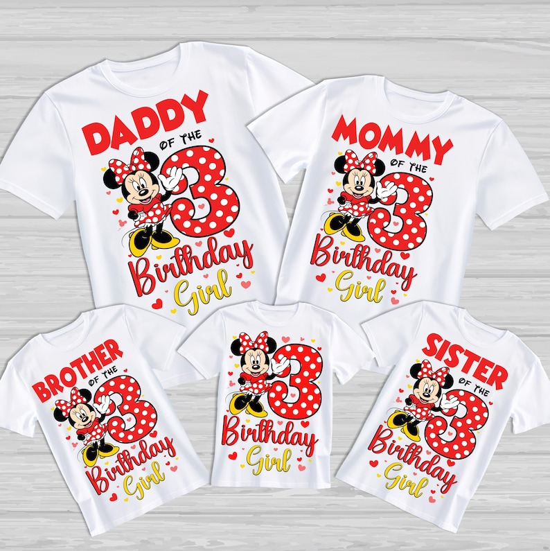 May include: White t-shirts featuring Minnie Mouse and the text "Daddy," "Mommy," "Brother," "Sister," and "Birthday Girl." Each shirt has a large red number "3" with polka dots. A family-themed design for a birthday celebration.