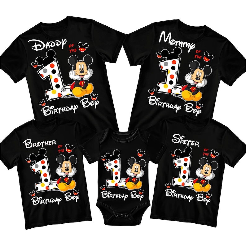 May include: Black family birthday shirts and a onesie featuring Mickey Mouse. Each shirt has a large number 1 with polka dots, Mickey Mouse, and the words "Daddy", "Mommy", "Brother", and "Sister". The onesie says "Birthday Boy".