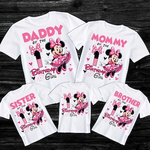 May include: White t-shirts with pink text and Minnie Mouse graphics. The shirts read "Daddy," "Mommy," "Sister," "Brother," and "Birthday Girl." Each shirt features a Minnie Mouse design with a number one and a bow.