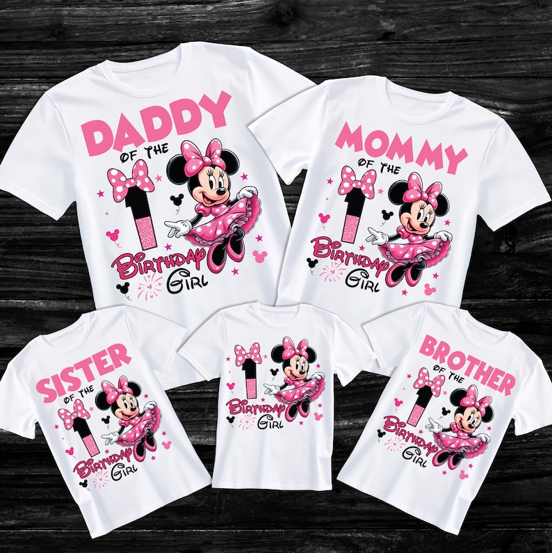 May include: White t-shirts with pink text and Minnie Mouse graphics. The shirts read "Daddy," "Mommy," "Sister," "Brother," and "Birthday Girl." Each shirt features a Minnie Mouse design with a number one and a bow.