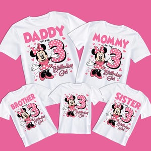May include: White t-shirts with pink text and Minnie Mouse graphics. The shirts read "Daddy," "Mommy," "Brother," "Sister," and "Birthday Girl" with the number "3." Hearts and polka dots decorate the design.