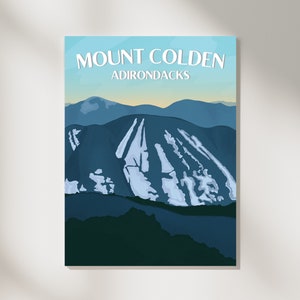 May include: A vintage-style poster with a blue and white illustration of Mount Colden in the Adirondacks. The text "Mount Colden" and "Adirondacks" is in white.