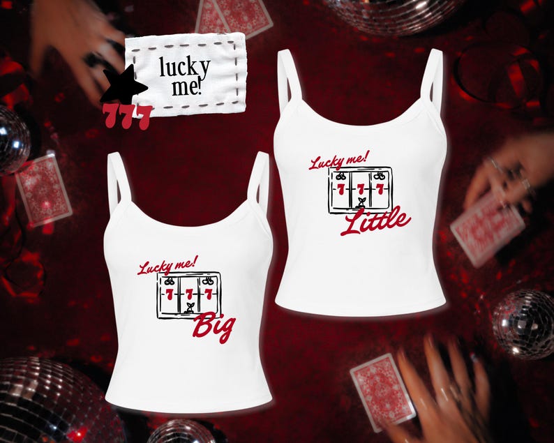 May include: Two white tank tops featuring a graphic of a slot machine displaying three red sevens. One tank top has the red text "Big" below the slot machine, and the other has the red text "Little". Both include the text "Lucky me!" in red.
