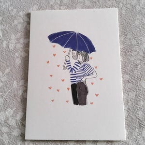 Doble tarjeta Nosotros bajo la lluvia