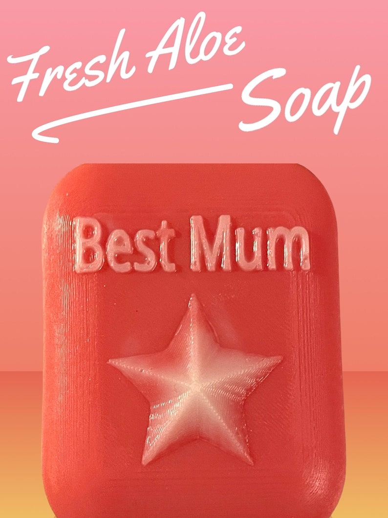 May include: A red soap bar with a white star and the text "Best Mum" in white lettering. The soap is labelled "Fresh Aloe Soap".