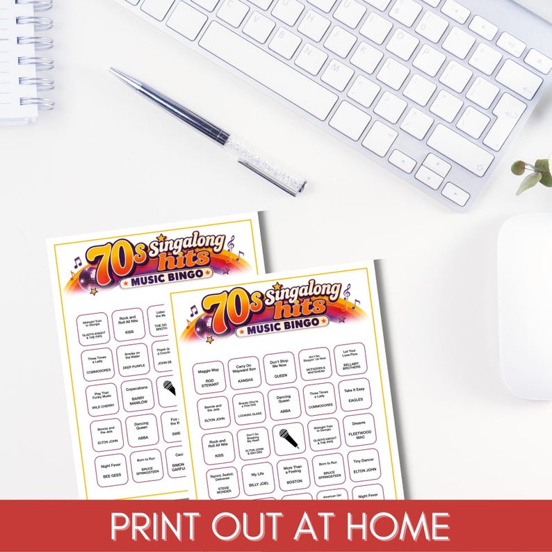 May include: Two white paper bingo cards titled 70s singalong hits MUSIC BINGO with a colorful rainbow graphic, musical notes, and a disco ball. The cards feature a grid of song titles and artist names, with one square showing a black microphone icon.