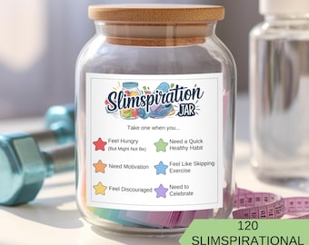May include: A glass jar with a wooden lid filled with colorful paper slips. The jar has a label that says "Slimspiration Jar" and lists different reasons to take a slip, such as "Feel Hungry (But Might Not Be)", "Need Motivation", "Feel Discouraged", "Need a Quick Healthy Habit", "Feel Like Skipping Exercise", and "Need to Celebrate". The label also includes a colorful illustration of a jar with fruit and a running shoe. The jar is sitting on a table with a dumbbell and a measuring tape.