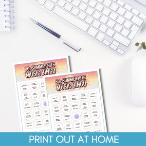 May include: Two 80s Summer Hits Music Bingo game sheets with a sunset design, a keyboard, a pen, and a computer mouse on a white desk. The text "PRINT OUT AT HOME" is at the bottom.