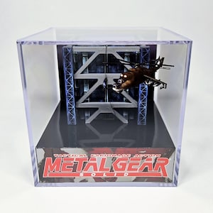 Metal Gear Solid Snake vs Flüssigkeit in Kommunikationstürmen - Diorama Würfel mit Sound und LED Licht - Dekor für Metal Gear Solid Liebhaber