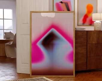 Puede incluir: Tres impresiones artísticas abstractas enmarcadas con una estética moderna. La impresión más grande presenta un diseño geométrico borroso rosa y azul. Dos impresiones más pequeñas muestran gradientes de color borrosos similares. Los marcos son de color madera clara.
