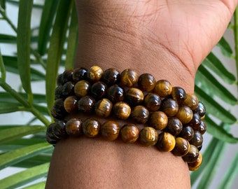 Crystal bracelets Genuine tigers eye, rose quartz, Smokey quartz, onyx.