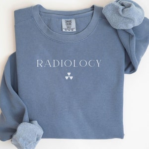 this is a white simple comfort colors sweatshirt