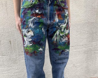 Levis thrifted and painted with images from Picasso Guernica Famous painting