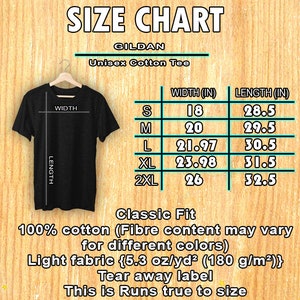 May include: Black unisex cotton tee shirt hanging on a wooden hanger. The image includes a size chart with measurements in inches for width and length, ranging from size small to 2XL. The text on the shirt reads "SIZE CHART".